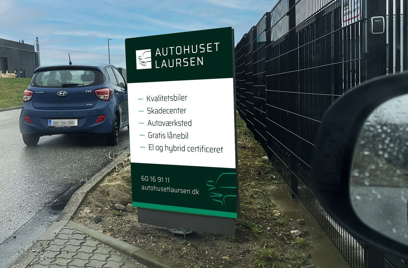 Skilt for autohuset laursen
