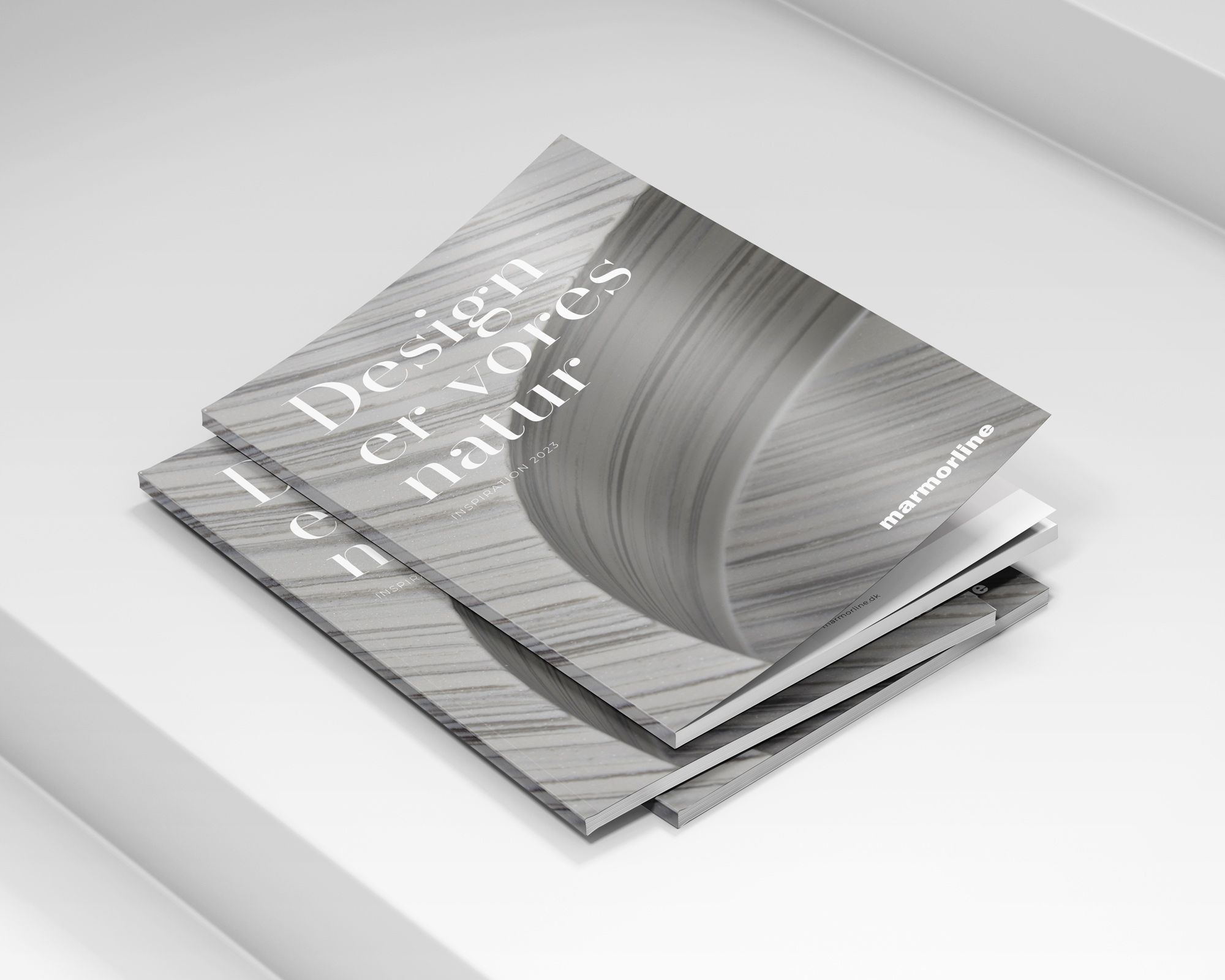 Billedet viser en stak marmorline magasiner